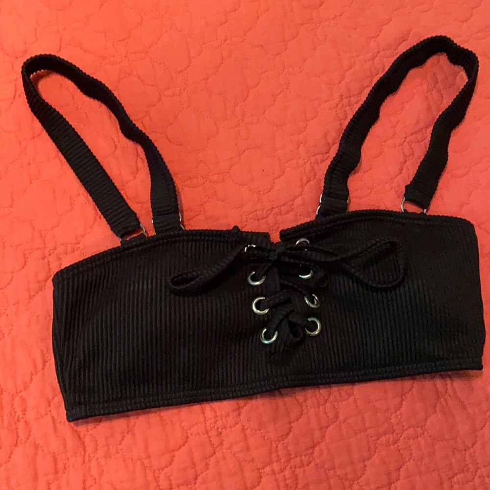 Bathing suit or crop top. Mark on side see photo